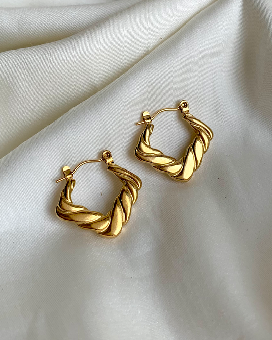 Edgy Artistry Hoop Earrings