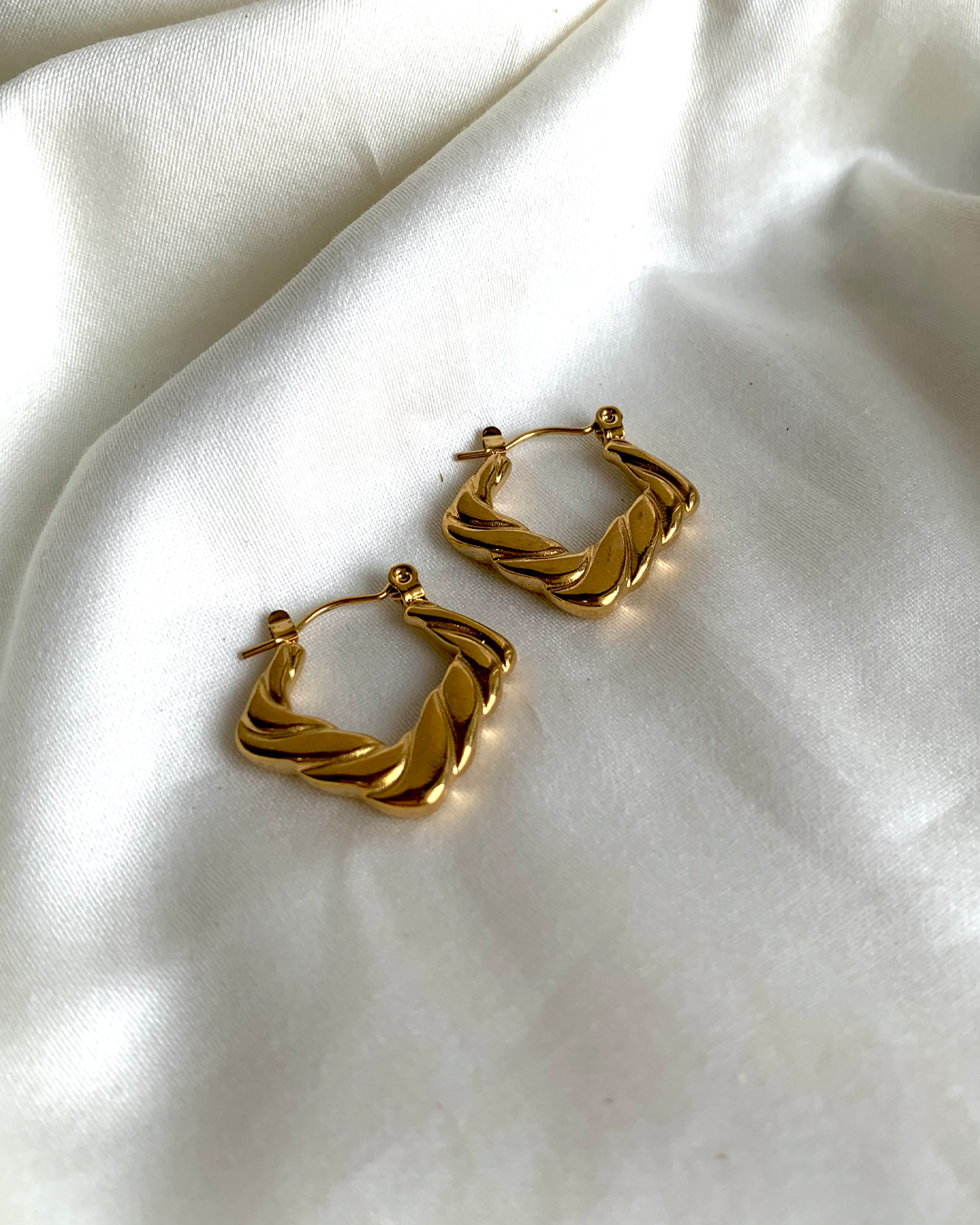 Edgy Artistry Hoop Earrings