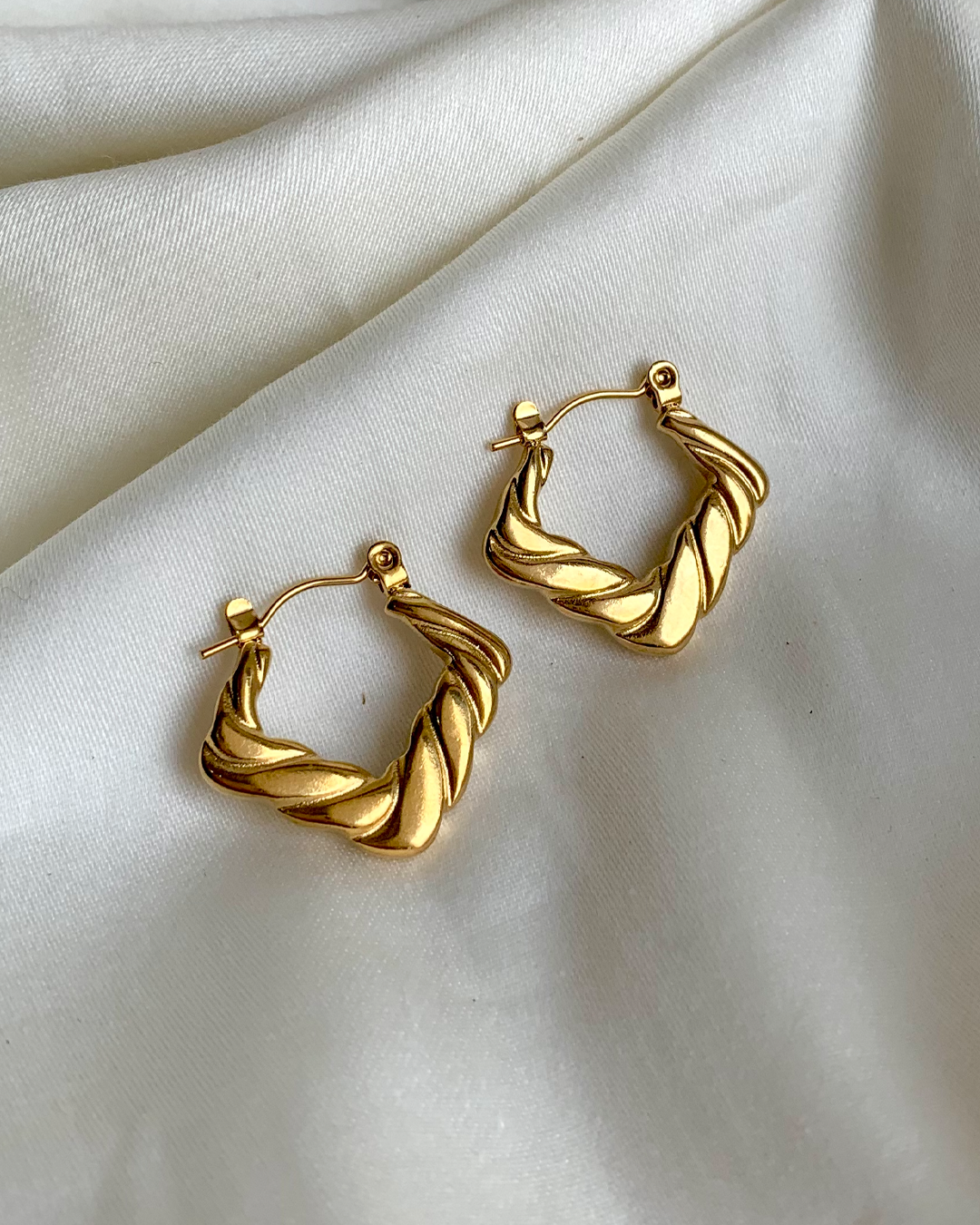 Edgy Artistry Hoop Earrings